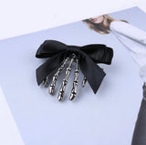 Bowknot Ribbon Skull Hand Hair Clip